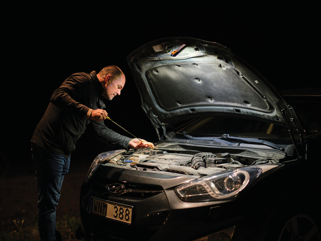 auto repair, car hood open, engine bay, mechanic, flashlight