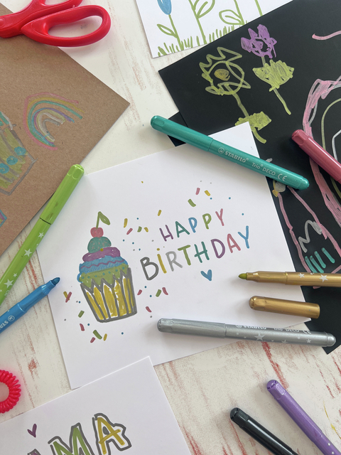 birthday card, cupcake, confetti, markers, drawing supplies
