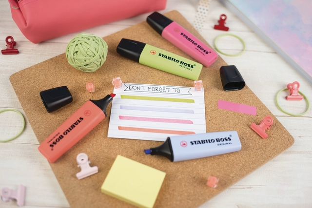 markers, highlighters, neon colors, sticky notes, corkboard