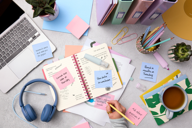 notebook, stationery, office supplies, post-its, headphones